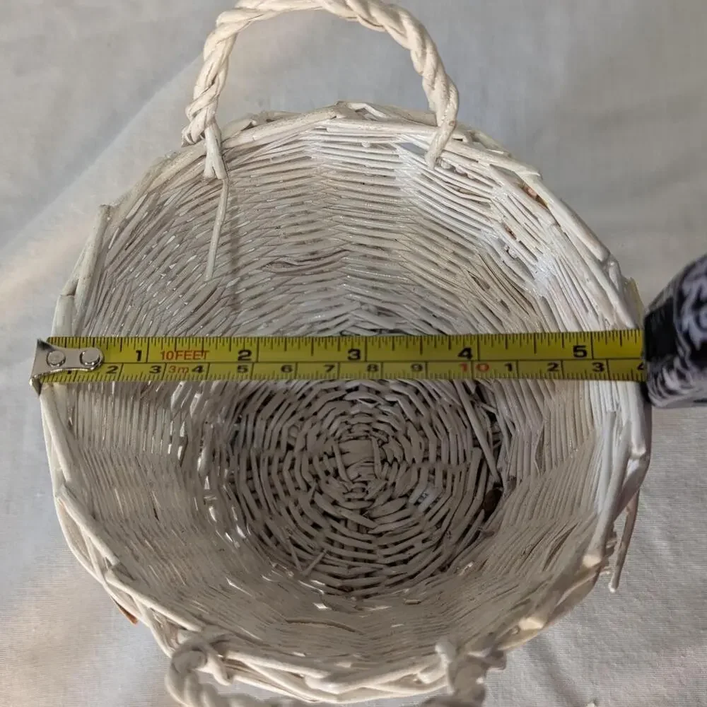 White wicker basket with handles